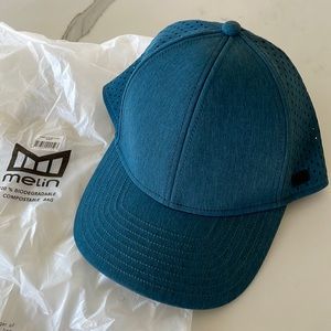 Melin Hydro A-Game XL cap. Color is Heather Ocean. This hat is new.